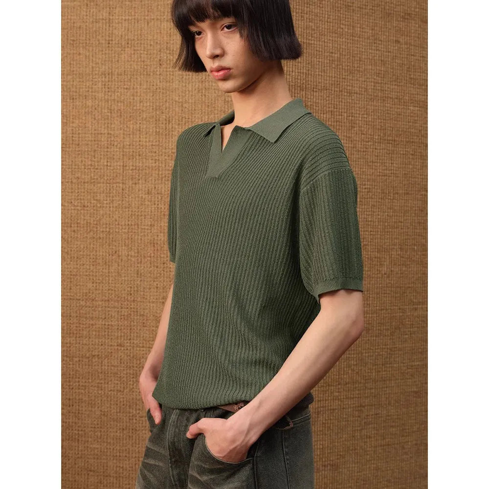 Men's creamy white short sleeve polo shirt with stripes and a loose casual fit.