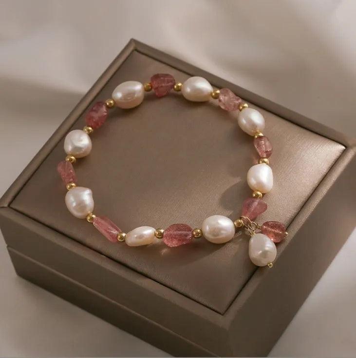 Handcrafted strawberry quartz crystal bracelet with Hetian jade peach blossom design for women