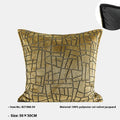 Gold geometric abstract pattern on a square polyester cushion cover with feather velvet pillow insert.