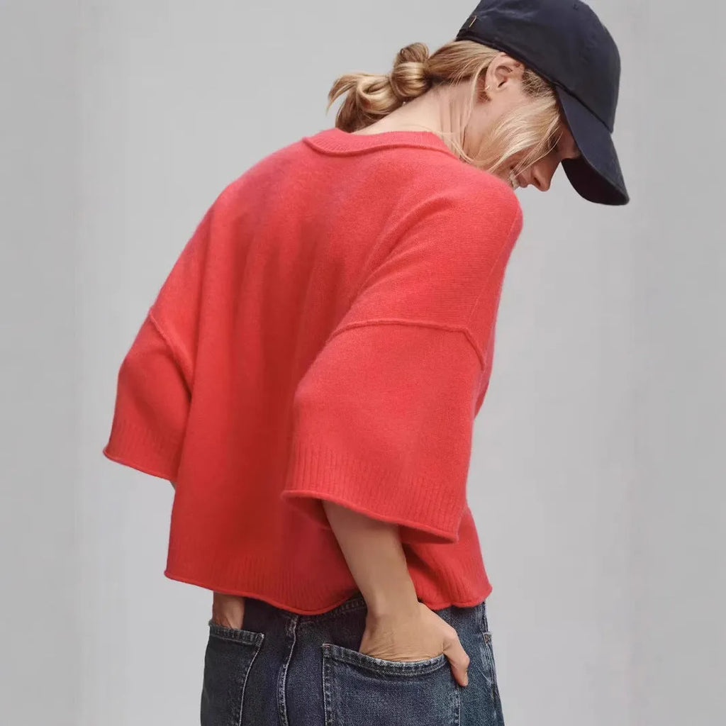 Red cropped viscose T-shirt with an exposed navel design on a mannequin, showing the short length and regular sleeves.