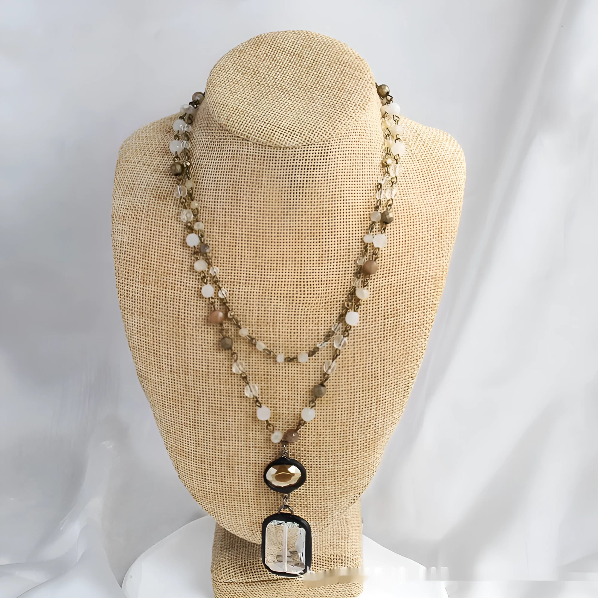 Tribal style two-layer chain necklace with stone and glass pendants in beige or blue colours