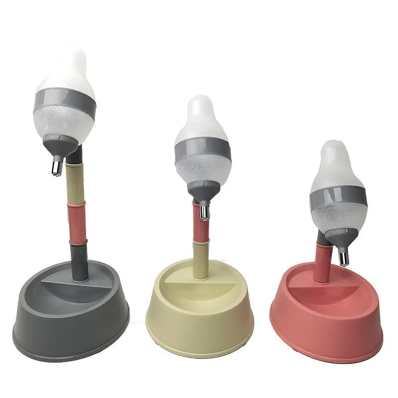Green adjustable height pet water dispenser with detachable bowl and ball-tip nozzle on a kitchen floor.