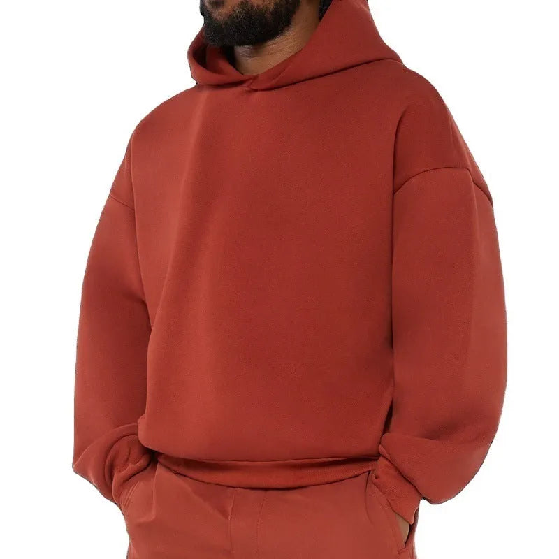 Men's solid colour fleece-lined cotton hoodie with a wool lining, shown in a pullover sweatshirt style.