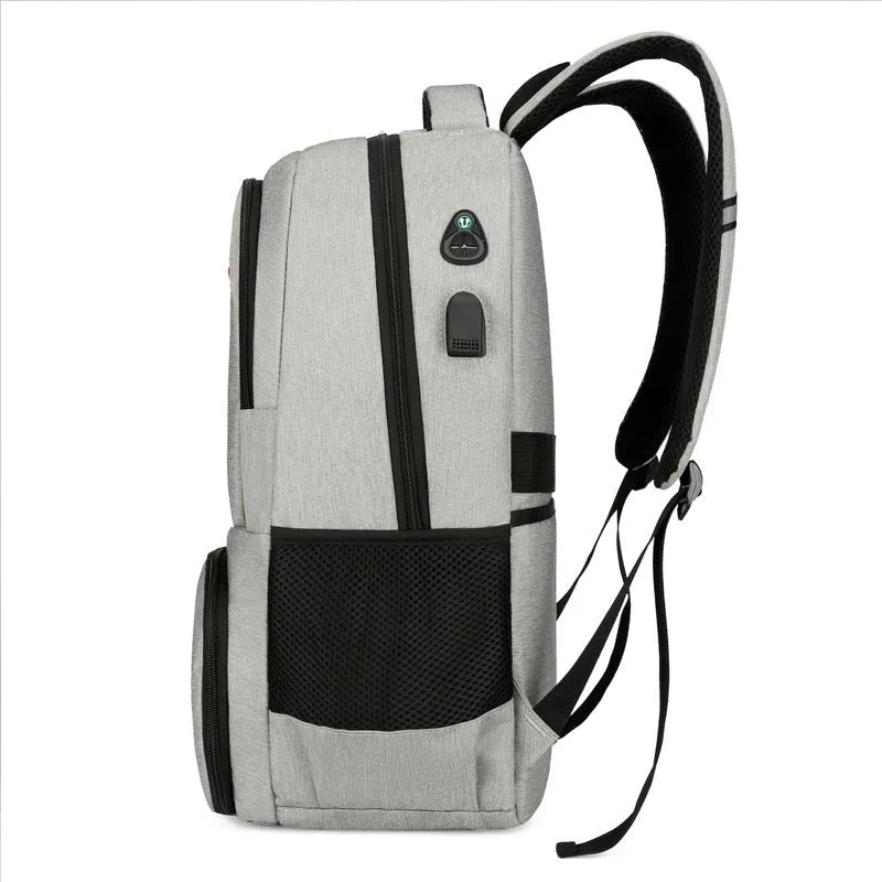 Light grey insulated Oxford cloth backpack with curved shoulder straps, shown with dry-wet separation compartment open.