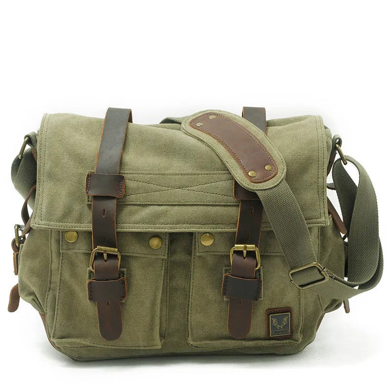 Men's brown canvas crossbody shoulder bag with cowhide trim and flap closure.
