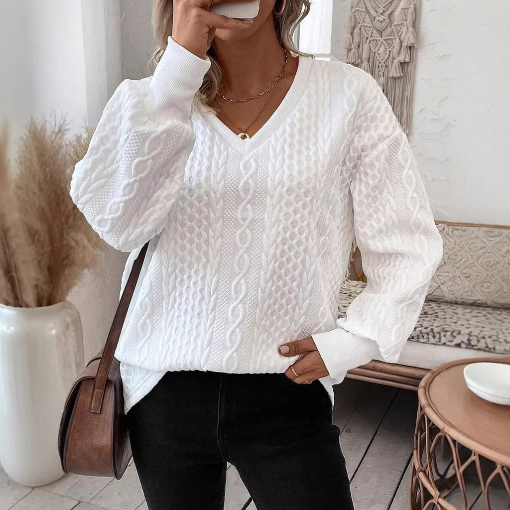 Milky white long sleeve T-shirt with 3D pattern design and loose fit silhouette