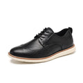 Men's black slip-on business casual shoe with round toe and carved PU upper detail on a TPR sole.