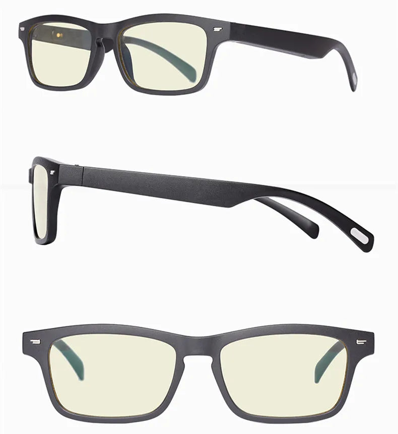 Black Bluetooth smart glasses with semi-open ear speakers and interchangeable lenses on a table with case.