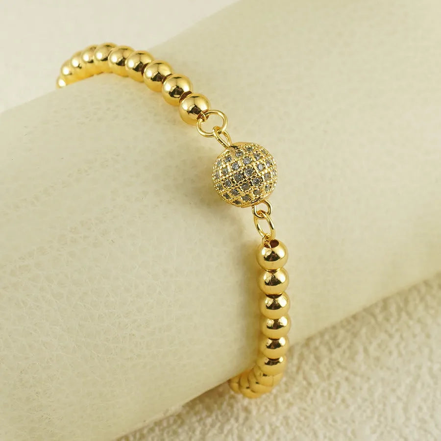 Women's copper bracelet with single zircon ball in heart-shaped Arabic style design