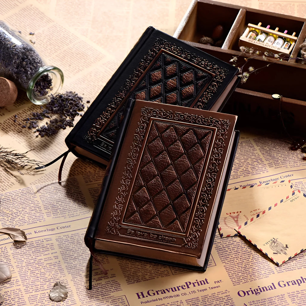 Embossed faux leather notepad with three-dimensional textured cover in bronze colour option
