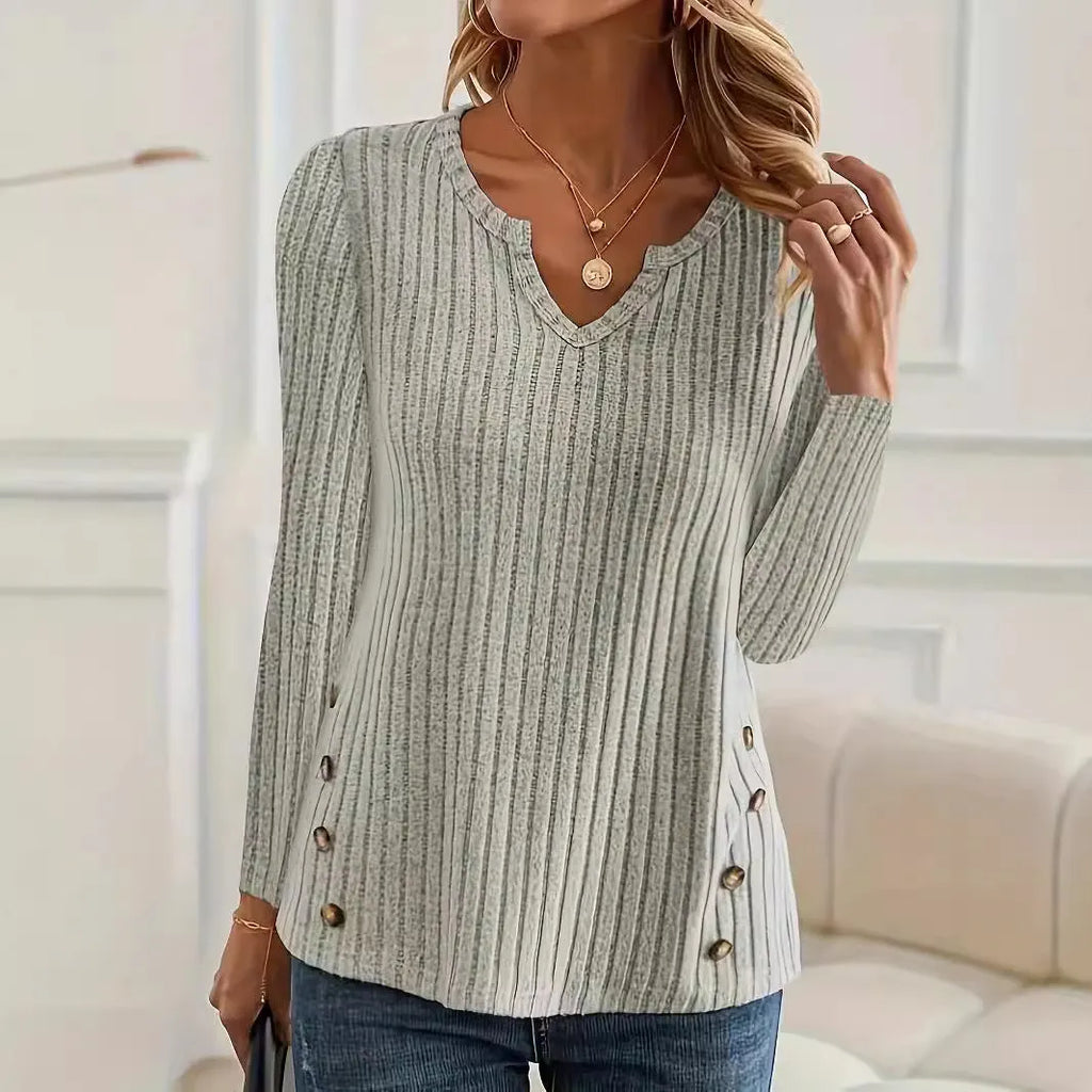 Casual grey green knitted pullover sweater with button fastening detail on the front.