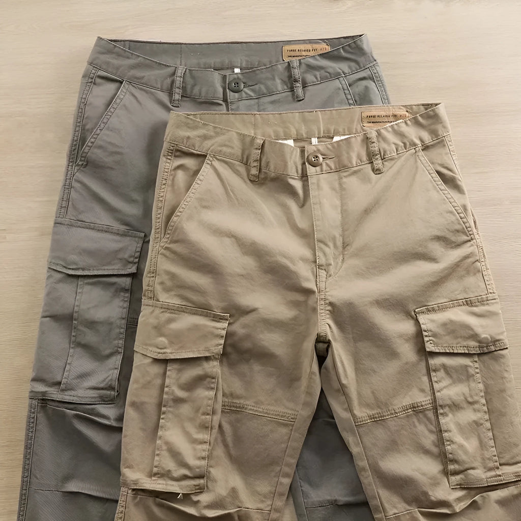 Men's multi-pocket cotton work trousers in cropped length showing cargo pocket design