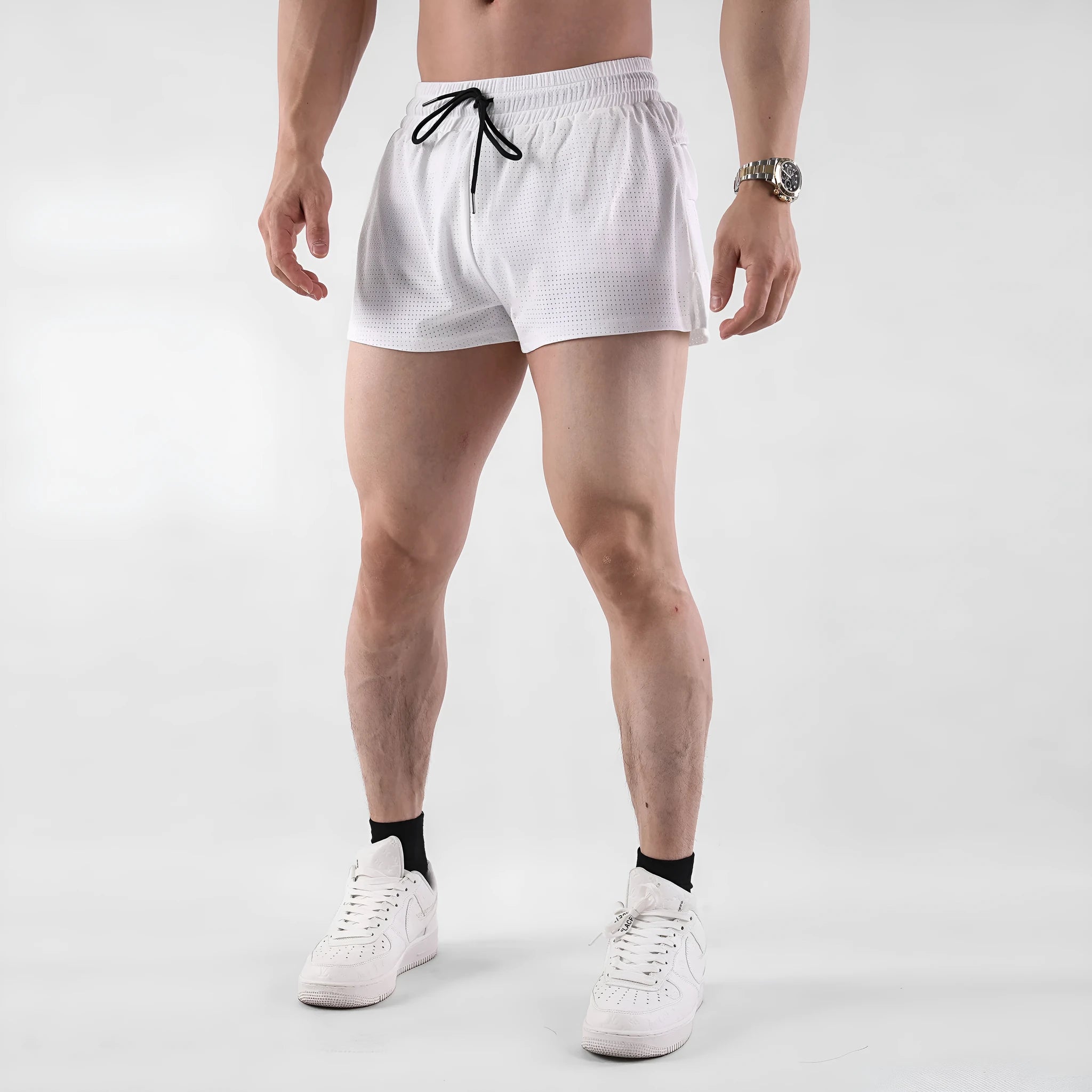 Men's quick-drying nylon shorts in black and white colours with mid waist fit