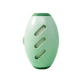 Green washable reusable gel lint roller ball for pet hair removal on a blue sweater.