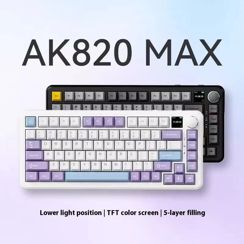 Black, grey, and yellow three-mode wireless mechanical keyboard with UK layout on a desk.