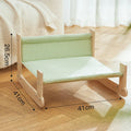 Wooden cat hammock bed with elevated design and cloth sleeping surface in blue colour