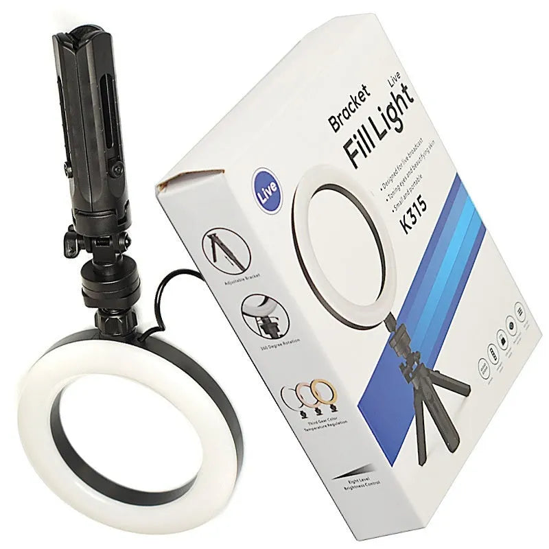 Black universal mobile phone bracket with adjustable fill light on a desktop tripod for live streaming.