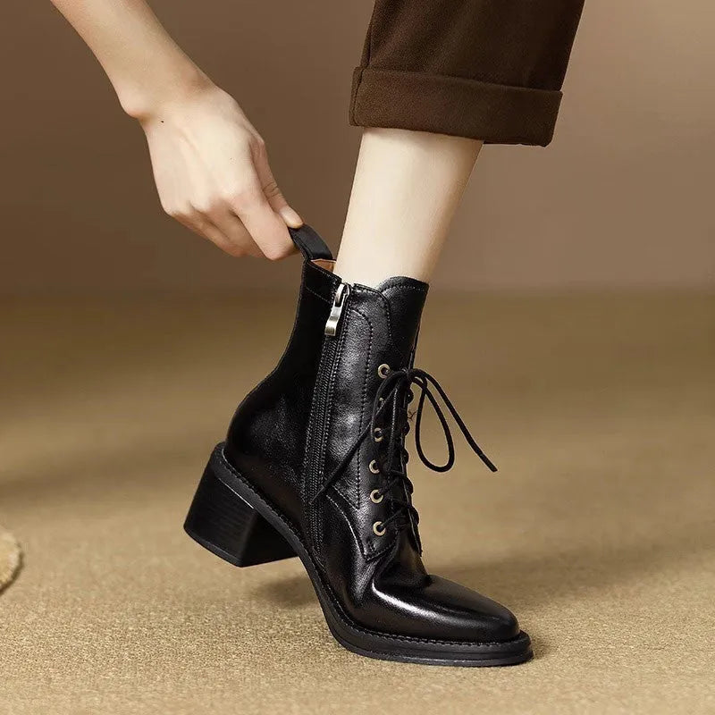 Women's black pointed-toe short tube boots with 5.5cm heel and artificial PU upper