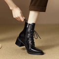 Women's black pointed-toe short tube boots with 5.5cm heel and artificial PU upper