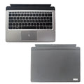 Official HP Elite X2 1012 tablet keyboard base on a desk, showing full keyboard layout and PS/2 connection cable.