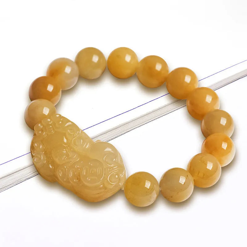 Golden Thread Jade money bracelet carved from Jinsi Jade showing large and small size options
