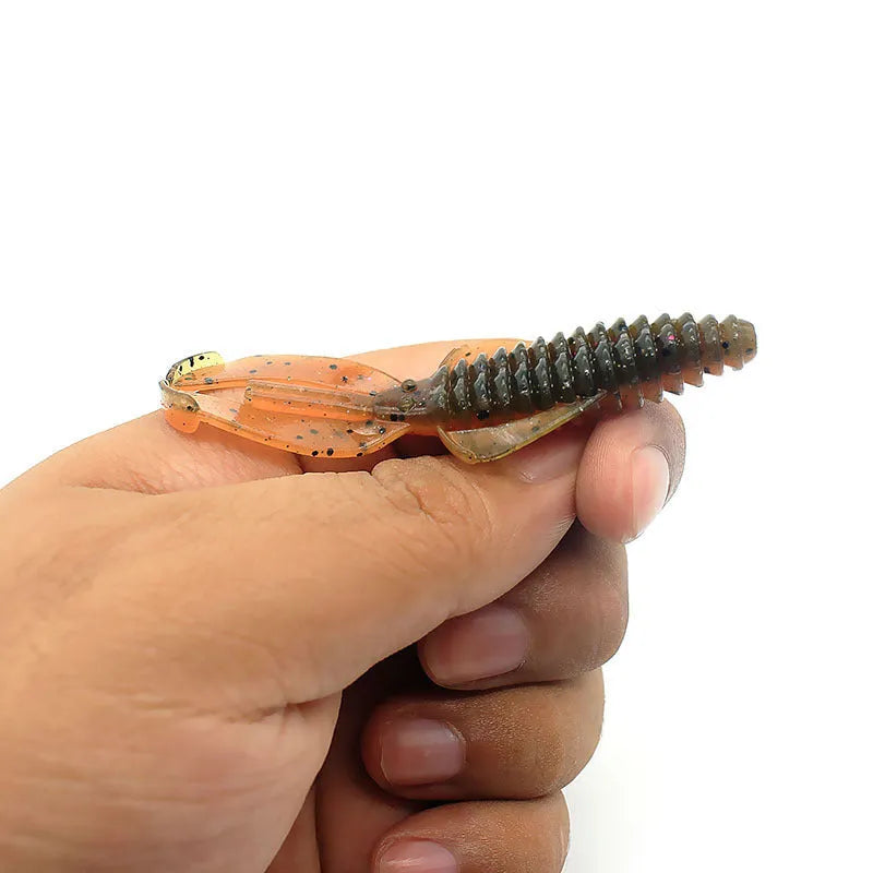 Soft PVC fishing lure artificial bait showing flexible construction and colour detail