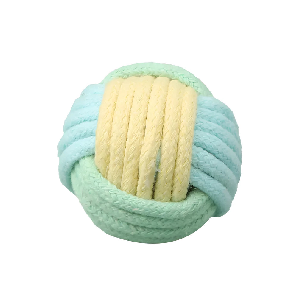 Four handmade plush cotton ball cat toys in blue powder, green blue, and pink green colours for teeth grinding play