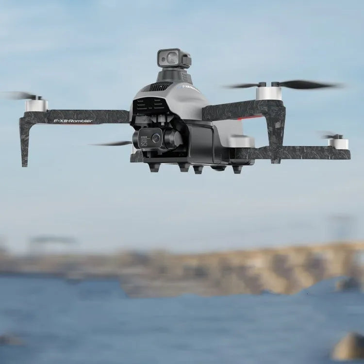 White folding quadcopter drone with camera, remote controller, batteries, and shoulder bag.