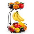 Black wrought iron double-layer fruit basket with open wire sides for storing fruits and vegetables.