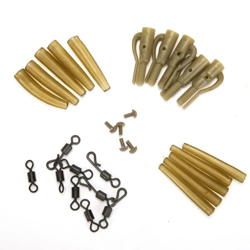 Thirty loose carp fishing accessory parts including anti-winding pipes, threaded hoses, rotation parts, and screws.
