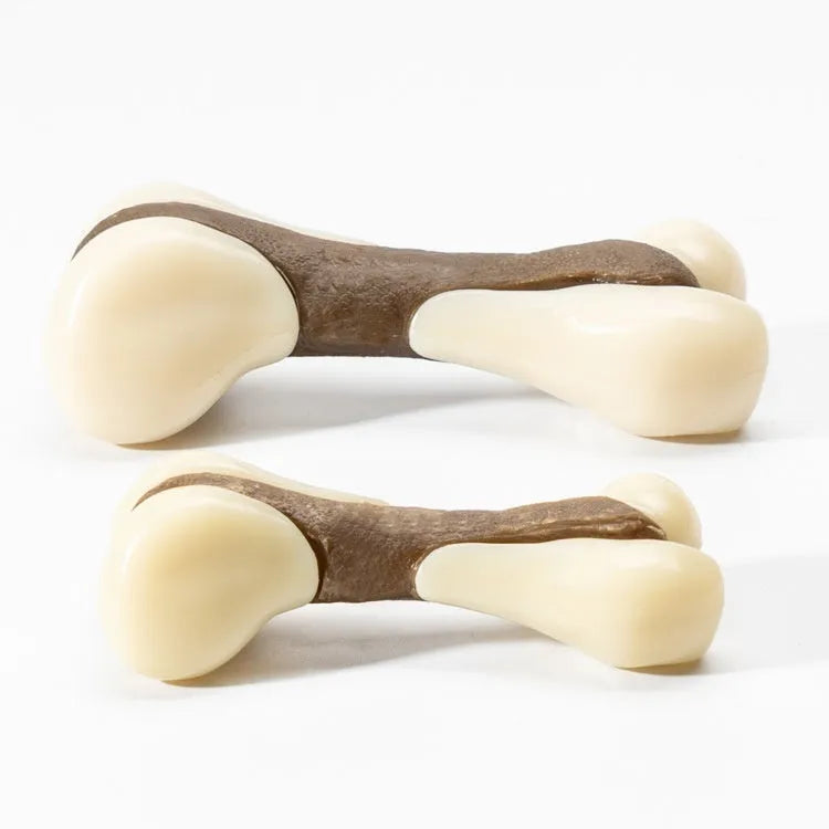 Bone-shaped dog chew toy in edible nylon and rawhide materials, available in small and large sizes
