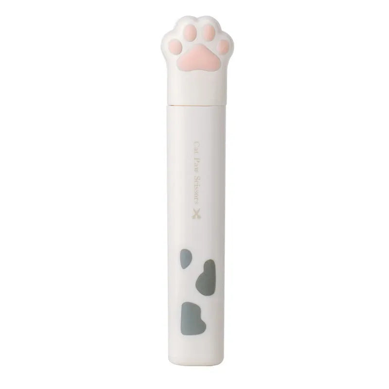 Closed cat paw mini folding scissors showing stainless steel blades and coloured handles.
