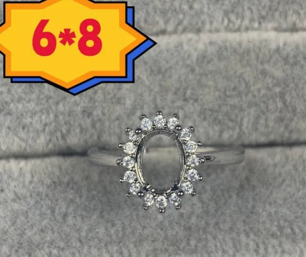 Korean style open mouth copper ring with 6x8mm oval denier stone and star decorations.