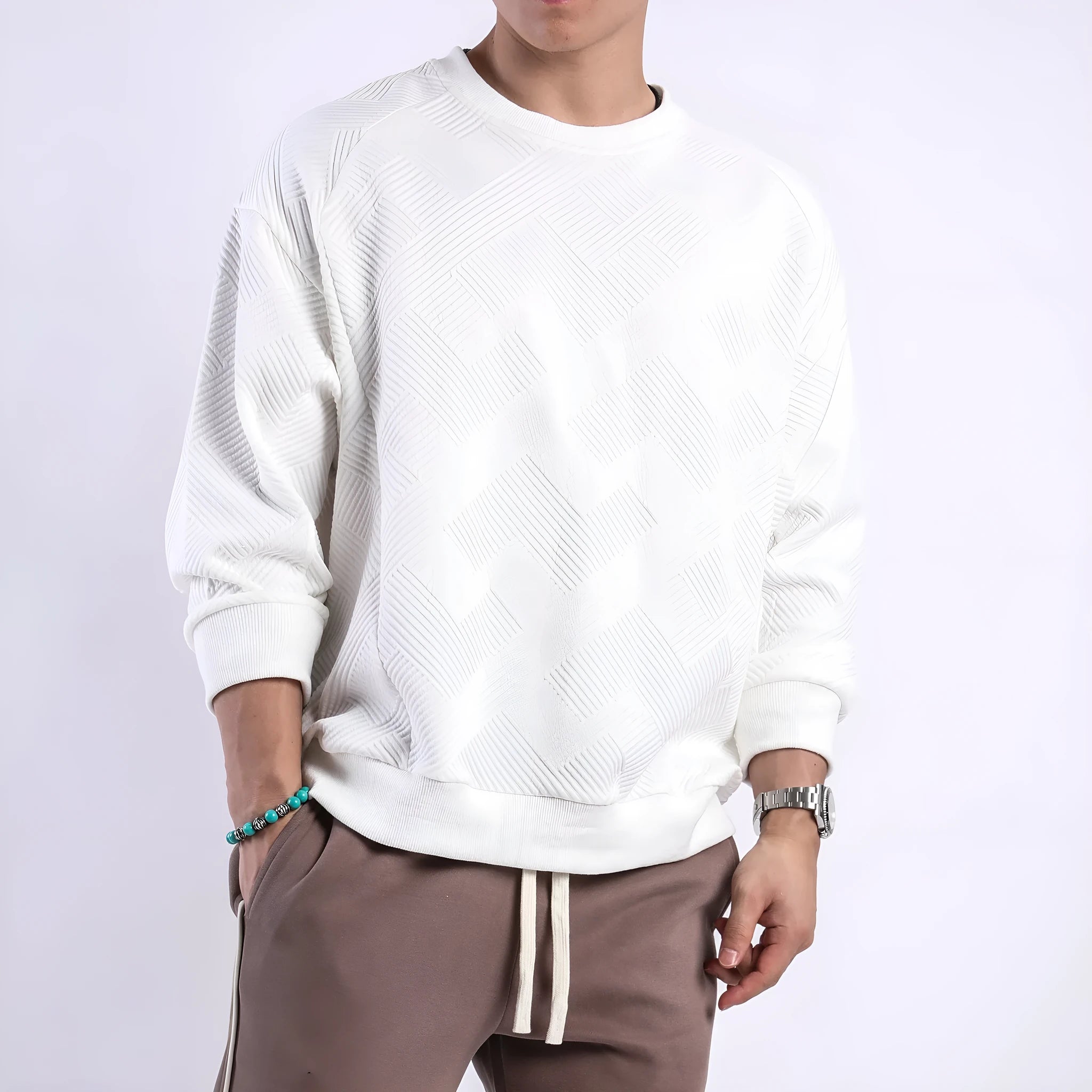 Men's loose fit long sleeve twill Jacquard sweater in solid colours on a hanger.