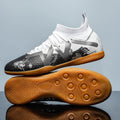 Adult low-top football boots in Black and Yellow colour with mesh lining and rubber sole.