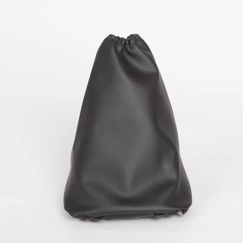 Black leather car shift lever dust cover for Toyota Corolla measuring 15.2 by 12.9 by 2.3 cm