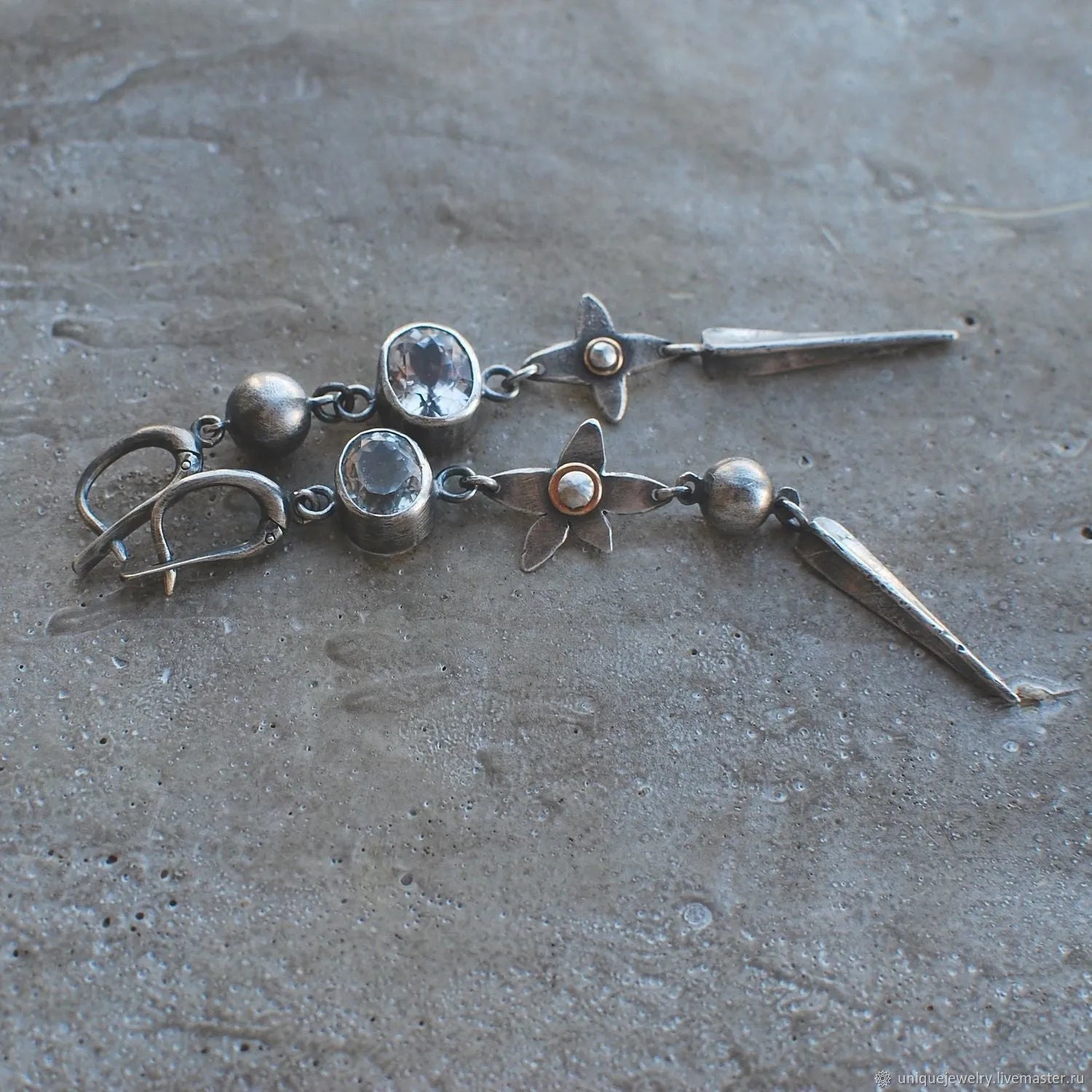Geometric antique silver pendant earrings with XINGX rhinestone design