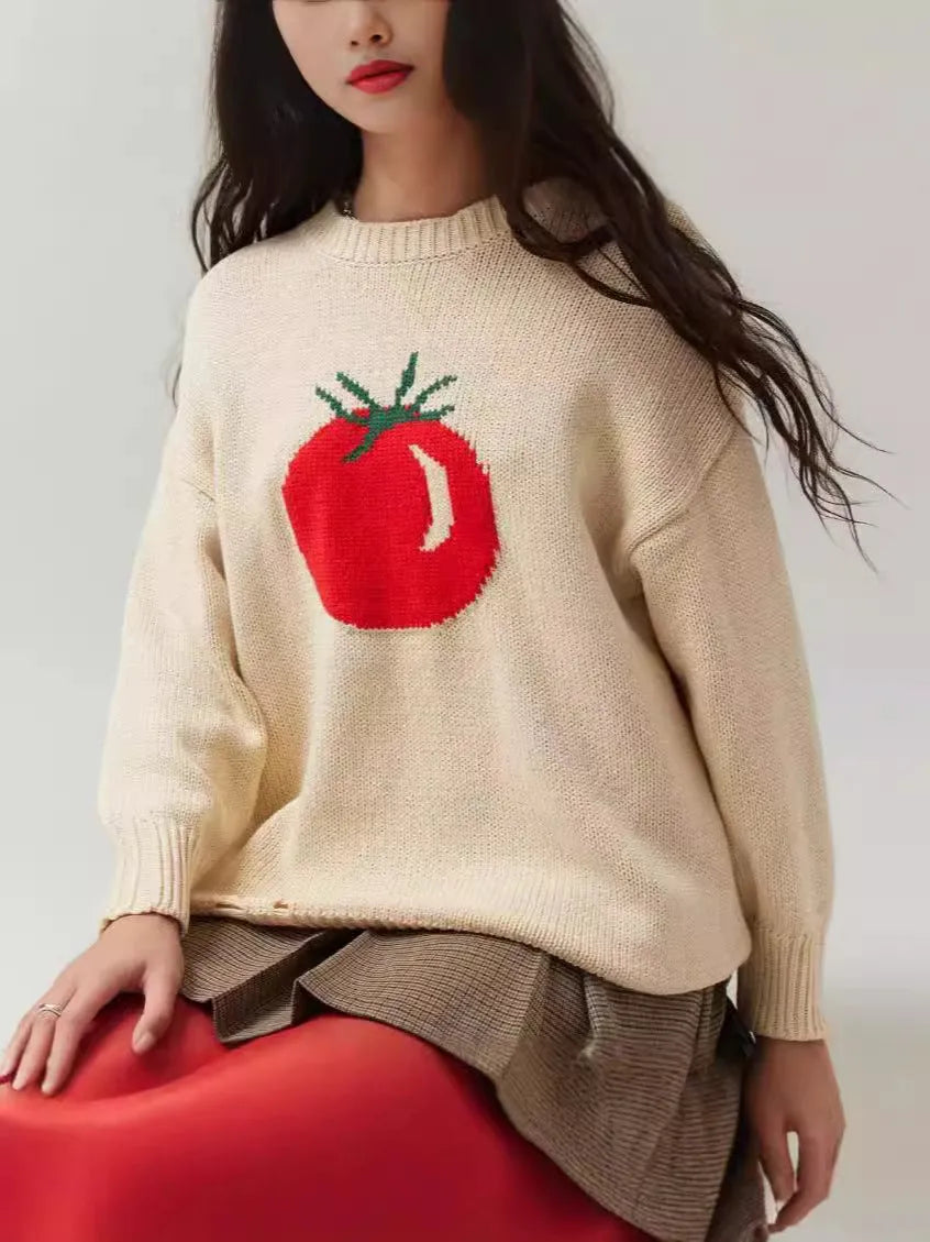 Women's milky white loose-fit acrylic jumper with jacquard knitting detail on front.