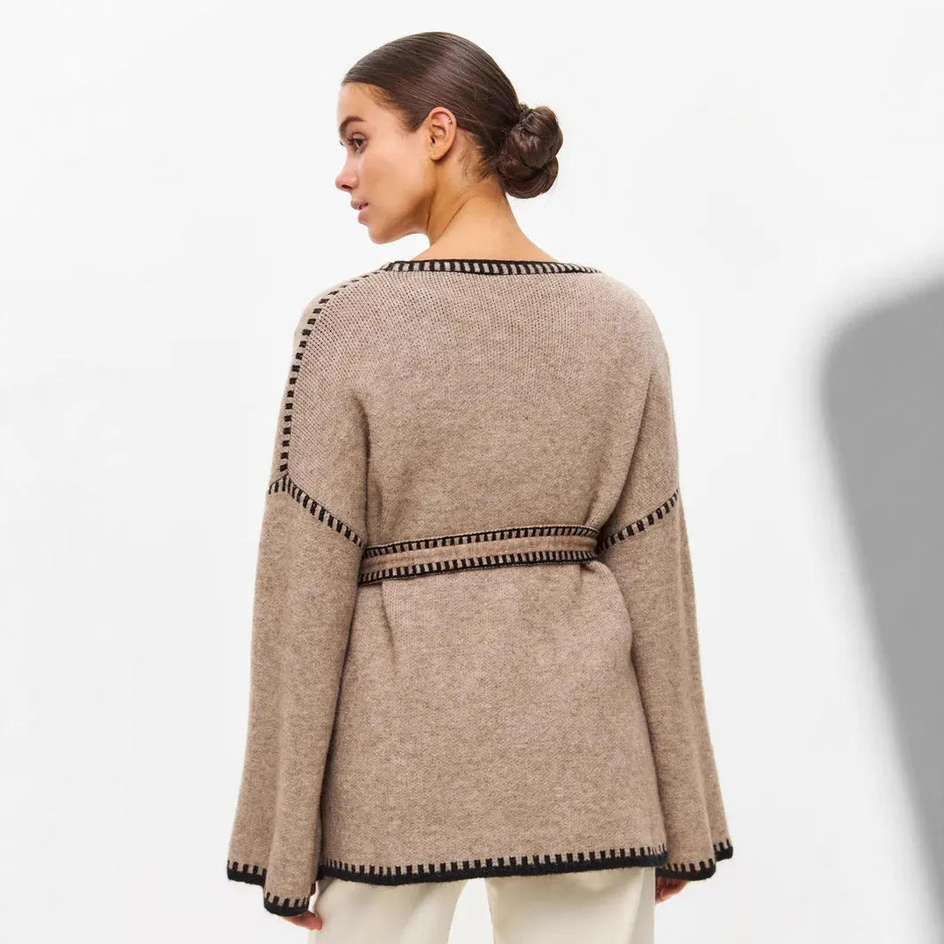 Loose fit knitted cardigan with lace-up sleeves in camel colour showing mid-length design