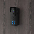 Black or white smart visual doorbell with camera, button, and waterproof casing for outdoor mounting.