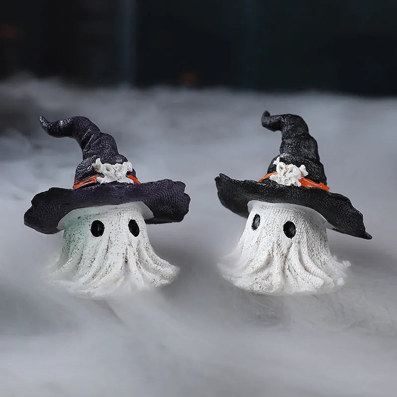 Small resin wizard hat ghost ornament in black or purple for holiday decoration.