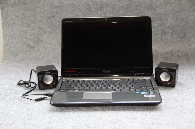 Black square USB-powered computer speaker for desktop PC audio enhancement