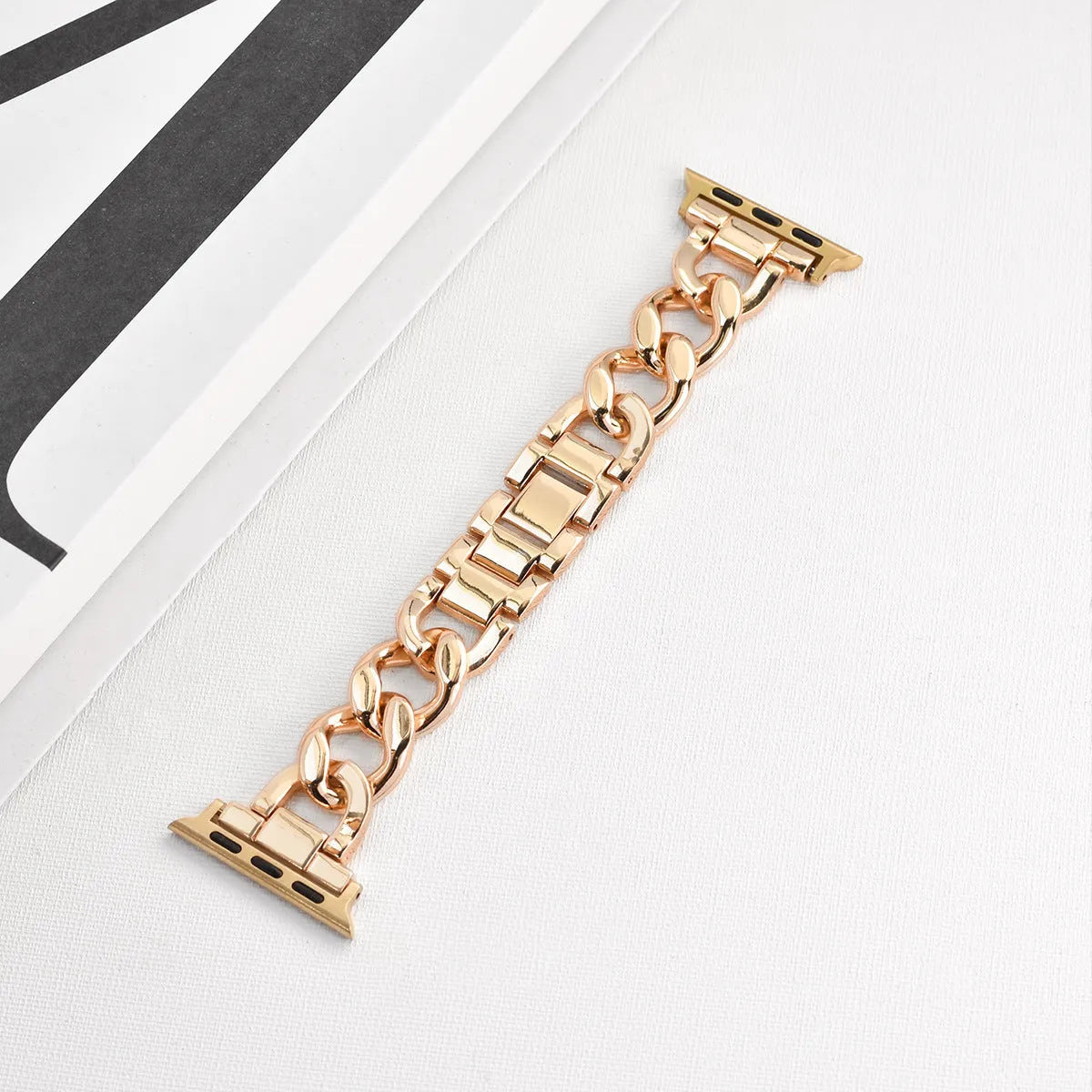 Denim chain design metal Apple Watch strap in multiple colour options showing lug connection
