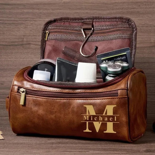 Men's black PU leather travel bag with seven interior compartments showing cosmetics section