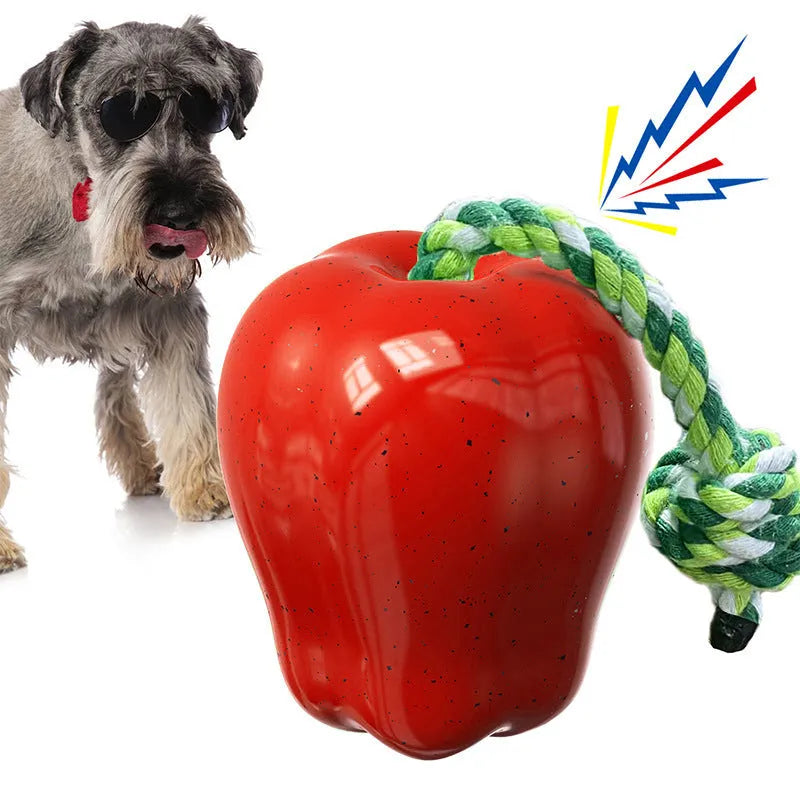 Green plastic apple-shaped dog food dropping ball with hollow treat compartment