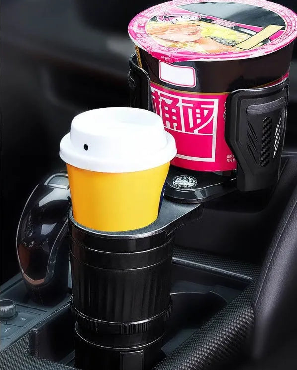 Black carbon fibre finish adjustable car cup holder with retractable base on a car console.