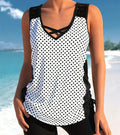 Women's printed boxer-style swimsuit set with matching top and shorts on a neutral background.