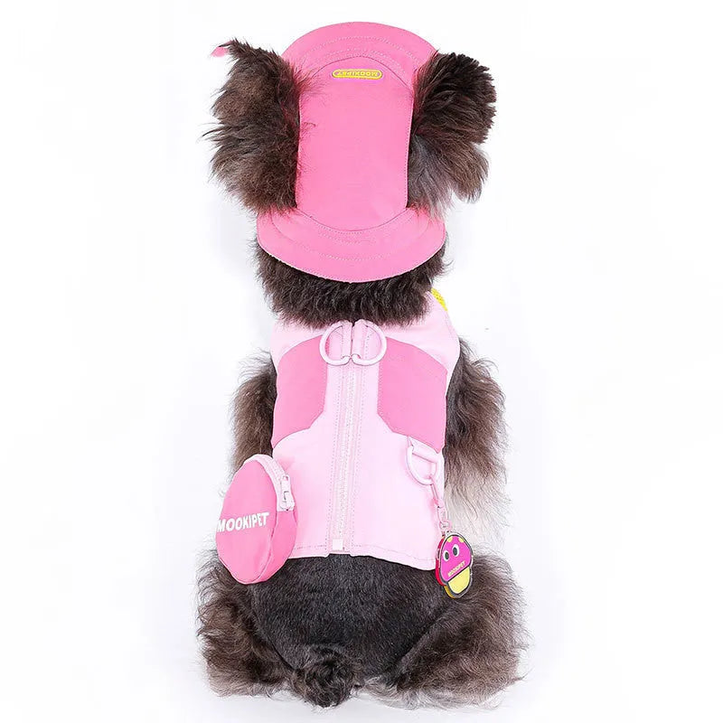 Pink polyester pet vest for small to medium dogs on a Bichon Frise