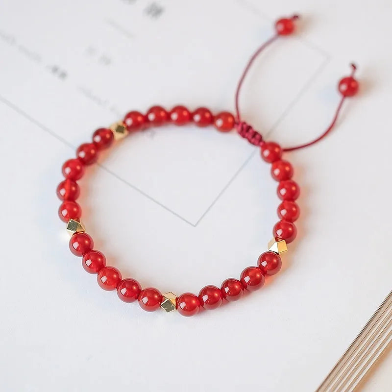 Hand-woven women's bracelet with natural red agate diamond beads in ethnic style design