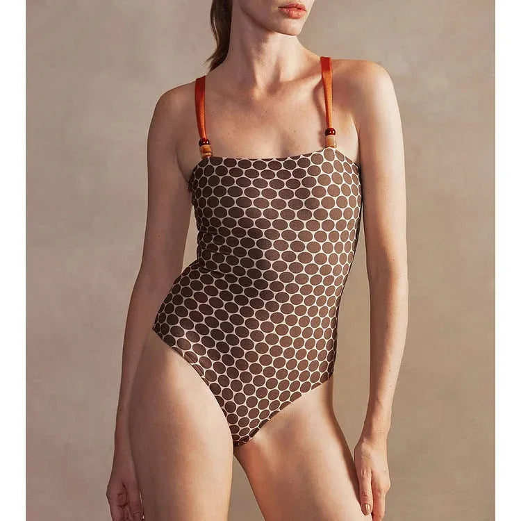 Women's dot pattern one-piece swimsuit with wrap skirt set in polyester fabric